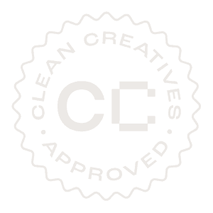 A round badge with a wavy edge displays the words "Clean Creatives Approved" in a circular layout around the initials "CC" in the centre.