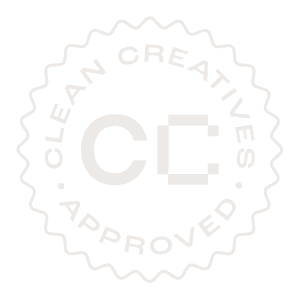 A round badge with a wavy edge displays the words "Clean Creatives Approved" in a circular layout around the initials "CC" in the centre.